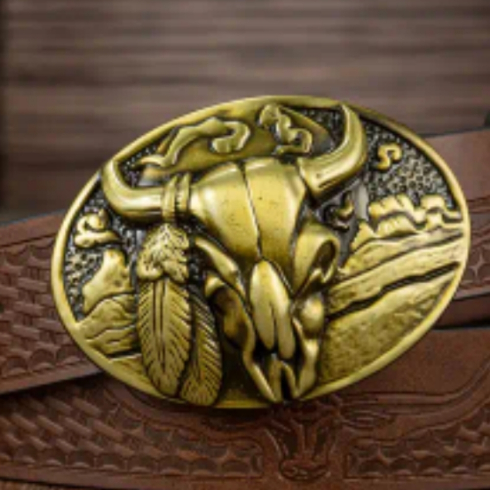 New gold Native American feathers and bull steer belt buckle approximately 3.75